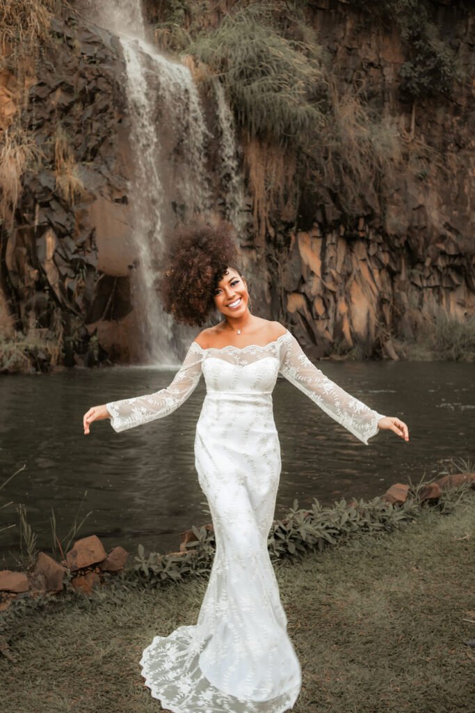 Bride posing while dancing by the waterfall river gorge - bride looking at her flowers while standing by the river gorge, waterfall - Bride resting her face on her groom's shoulders while dancing, smiling gracefully, Jacksonville wedding photographer, St. Johns River wedding, Florida beach wedding, Riverside wedding venue, San Marco wedding photos, Jacksonville Beach ceremonies, Ponte Vedra wedding, Treasury on the Plaza, River House St. Augustine, Jacksonville Beaches wedding, The White Room wedding, TPC Sawgrass wedding, Garden Club of Jacksonville, romantic sunset photos, Florida golden hour, Atlantic Beach wedding, Neptune Beach celebration, Jacksonville Arboretum photos, Downtown Jacksonville portraits, River City wedding, Ribault Club wedding, Epping Forest Yacht Club, Windsor Parke Golf Club, The Ritz-Carlton Amelia Island, Oceanfront ceremony, Spanish moss backdrop, Southern charm wedding, Jacksonville historical venues, Florida live oak trees, waterfront ceremonies, Cummer Museum gardens, The Club Continental, Jacksonville Golf & Country Club, maritime details, Jacksonville skyline photos, First Coast wedding, Northeast Florida wedding, coastal elegance, tropical florals, palm tree backdrop, destination wedding Jacksonville, intimate beach ceremony, luxury venue photography, Villa Blanca wedding, Jacksonville candid moments, wedding photojournalism, bridal party beach photos, Jacksonville engagement session, River & Post rooftop, black and white moments, emotional first look, MOSH rooftop wedding, Unity Plaza events, Friday Musicale venue, Jacksonville University, plantation wedding photos, natural light portraits, sunset beach portraits, romantic garden ceremony, The Glass Factory wedding, Sweet Pete's Candy wedding, authentic moments, Jacksonville architecture, historic Springfield photos, Riverside romance, Avondale wedding, vintage Jacksonville, metropolitan photos, cultural venues, Marineland wedding, The Manor at 12 Oaks, The Mansion at Glen Cove, Jacksonville Botanical Gardens, Jacksonville Zoo wedding, military wedding Jacksonville, NAS JAX celebration, timeless portraits, emotional storytelling, creative compositions, artistic wedding photos, film photography style, traditional southern wedding, modern Jacksonville wedding, urban wedding photos, classic bride portraits, documentary approach, bride and groom portraits, getting ready moments, wedding day details, wedding party photos, ceremony coverage, reception moments, dance floor candids, wedding rings macro, bridal accessories, venue details, wedding decor shots, architectural elements, dramatic lighting, romantic poses, authentic emotions, family formal photos, morning preparation, evening celebration, golden light portraits, destination details, venue exterior shots