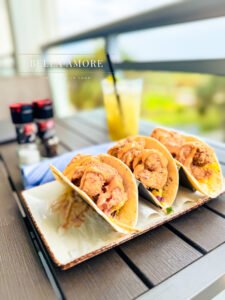 Professional Food photography - picture of shrimp tacos and margaritas by the pool