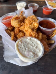 Environmental Professional Food photography - picture of a prepared basket of chicken fingers with dipping sauces