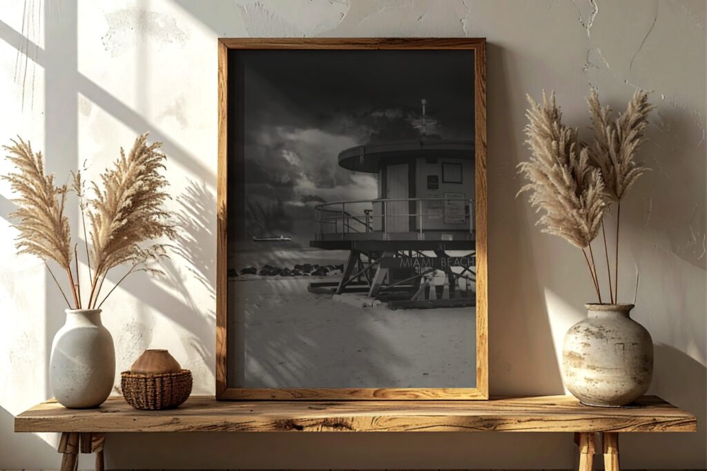 Ashley Reavis Miami Storm, 2024 for sale, Evans, Georgia. Black and white vintage print of a lifeguard shack on the Miami beach coastline with a cruise ship sailing by.